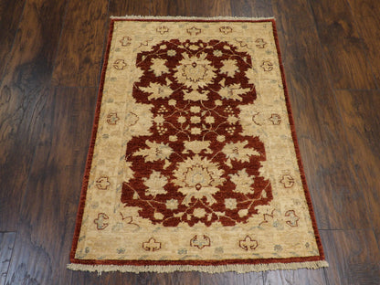 Close-up of wool pile, beige and red rug