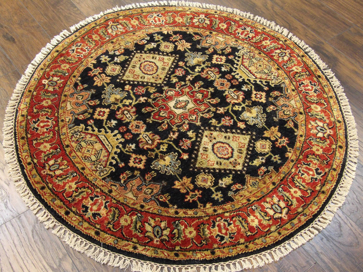Full view of tribal Serapi round rug