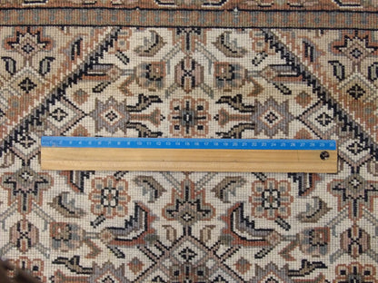 Beige & Rust Fine Persian Mir Herati rug in room setting