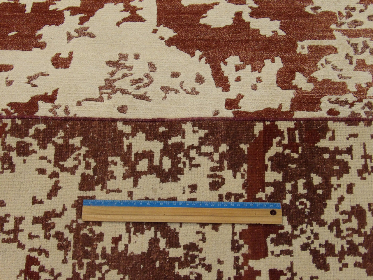 Full room view of modern abstract mosaic hand-knotted rug