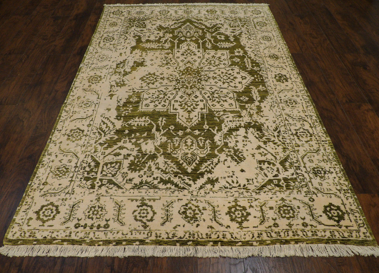 Close-up of wool-silk pile, green and ivory rug