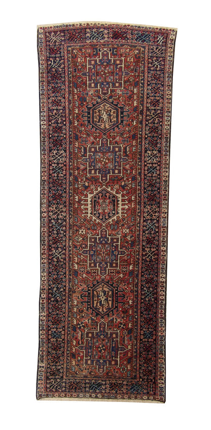 Traditional Antique Heriz hand-knotted wool rug in Rust, full view