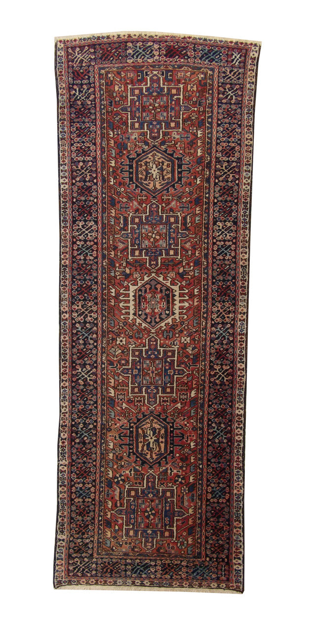 Traditional Antique Heriz hand-knotted wool rug in Rust, full view