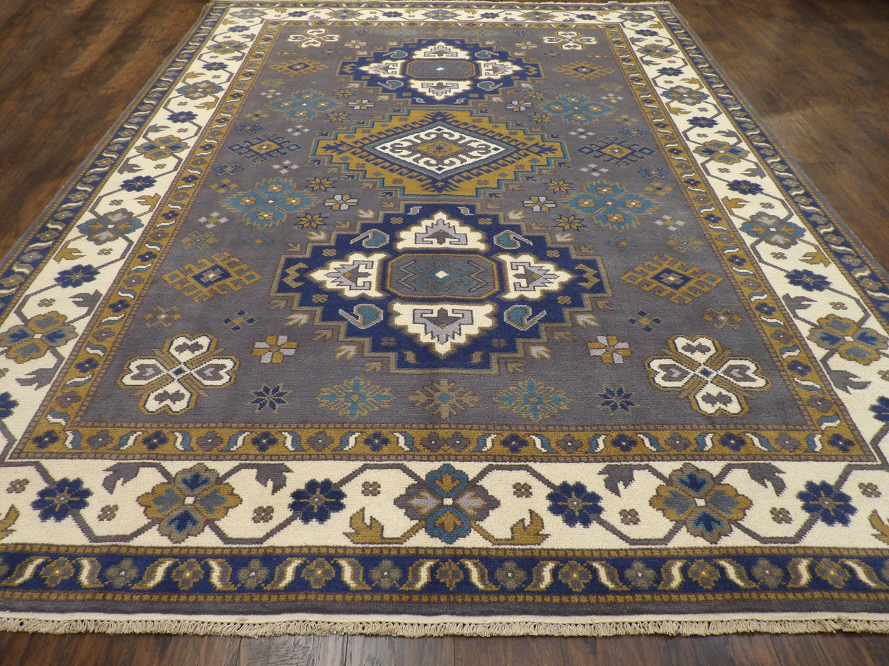 Tribal Kazak rug corner detail