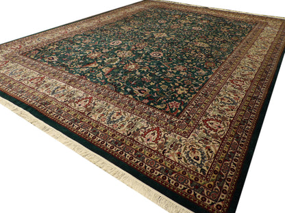 Kashan medallion pattern detail, green and beige rug