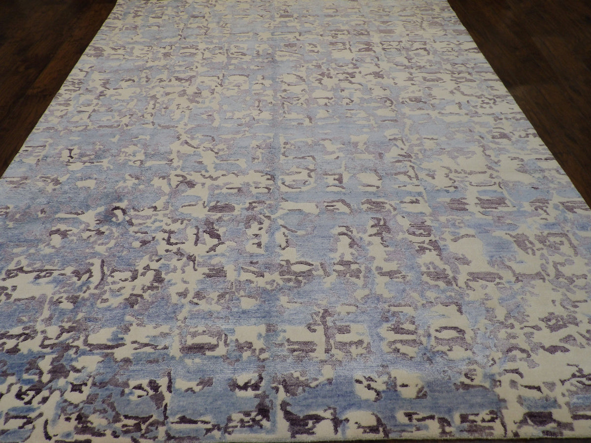Blue carved rug in a modern living room setting
