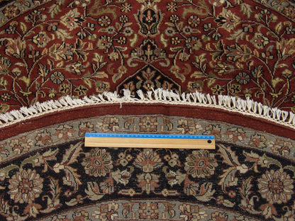 Black & Red Fine Persian Tabriz rug in room setting