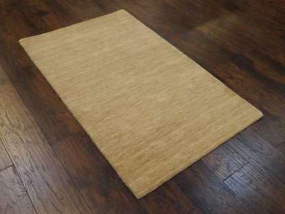 Beige and gold Moroccan rug in a home office setting