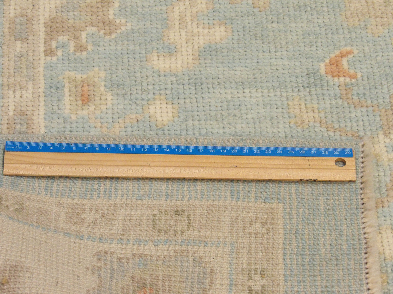 Blue & Beige Vintage Oushak rug in room setting