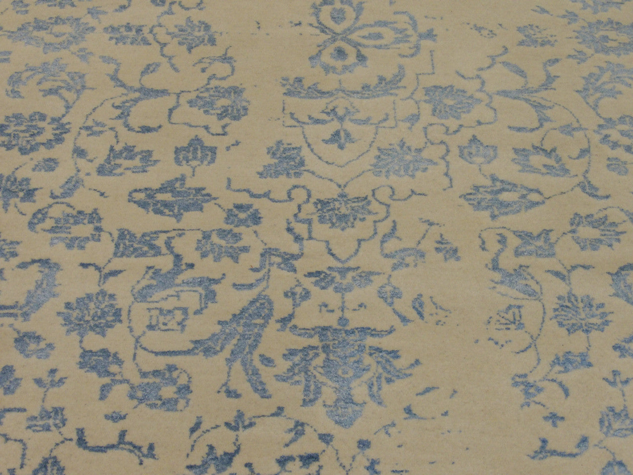 Back of transitional hand-knotted rug