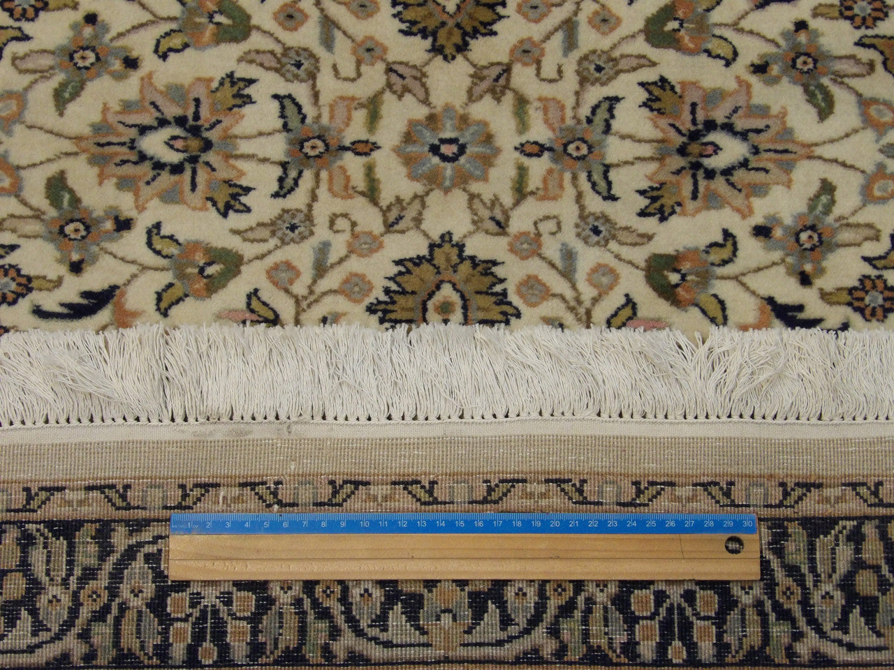 Blue and ivory Kashan runner in hallway setting
