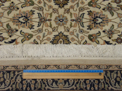 Blue and ivory Kashan runner in hallway setting