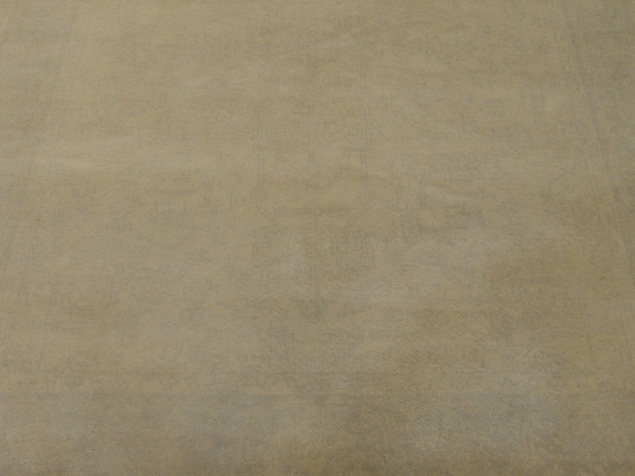 Back of Oushak hand-knotted rug