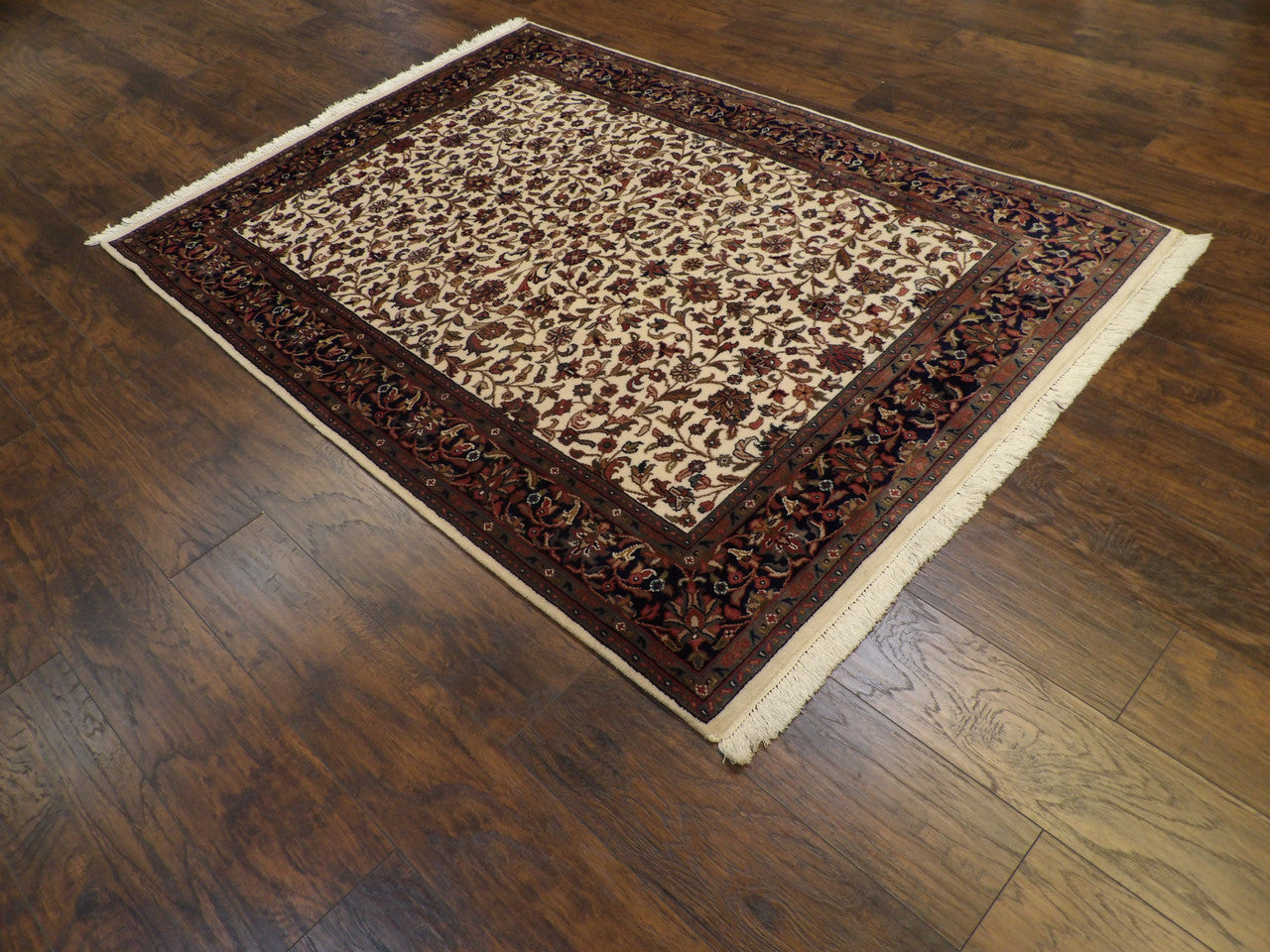 Blue Kashan rug in a room setting
