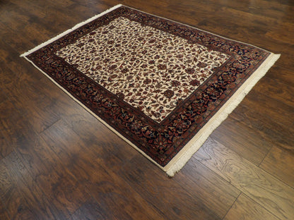 Blue Kashan rug in a room setting