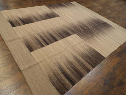 Coastal pattern detail, black rug