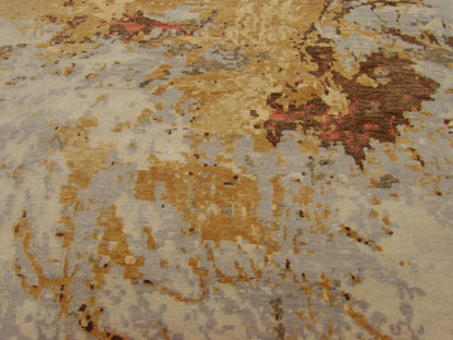 Close-up of wool-silk pile, gold and purple rug