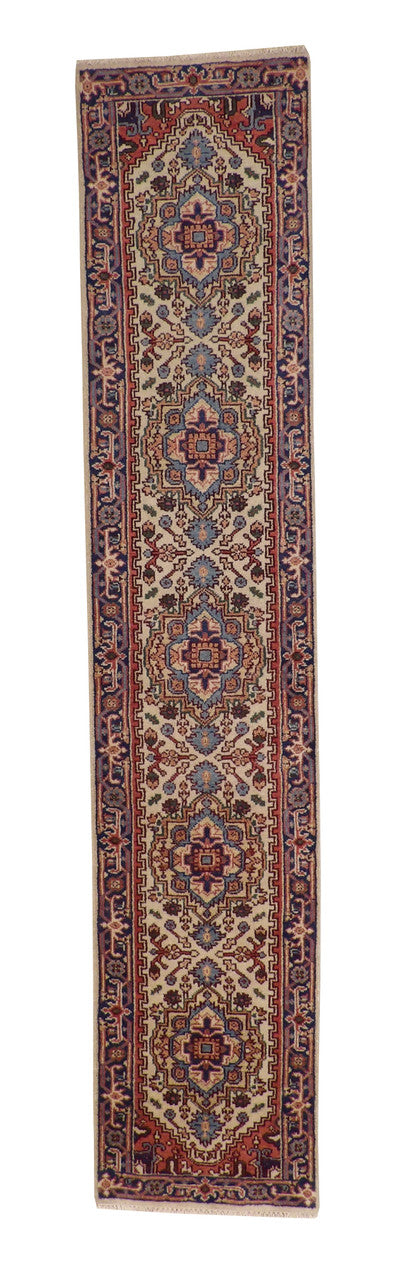 Tribal Heriz hand-knotted wool rug in Beige, full view