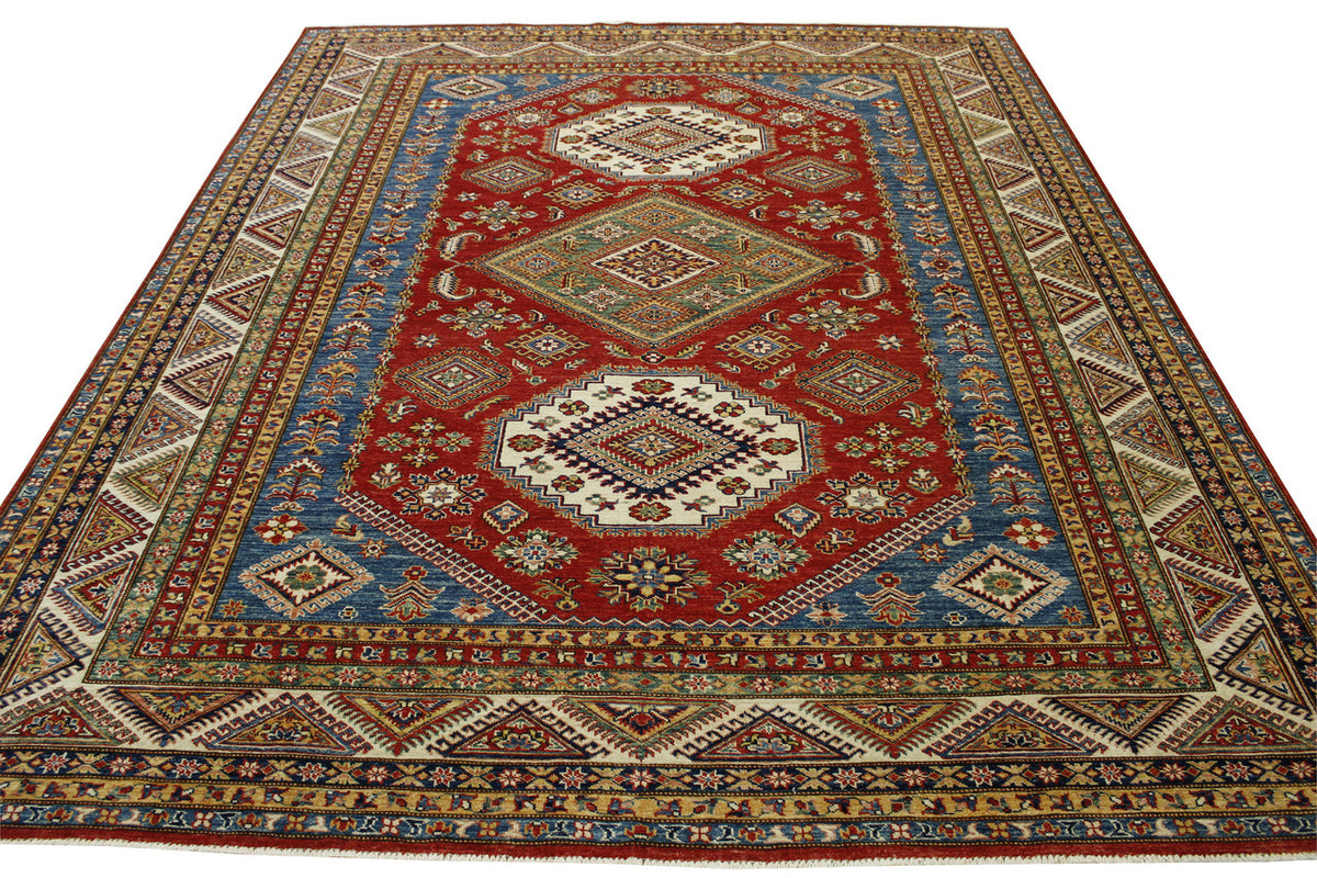 Close-up of wool pile, Red, Ivory, Rust & Beige rug