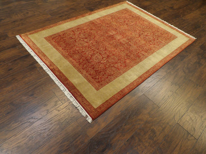 Carved pile pattern detail, gold and red rug