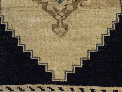 Yastik rug edge and fringe detail, beige and black