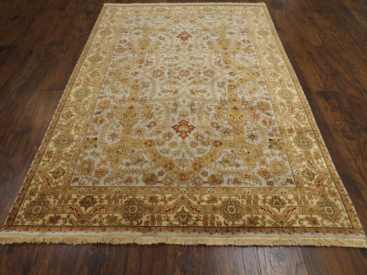 Close-up of wool pile, blue and gold rug