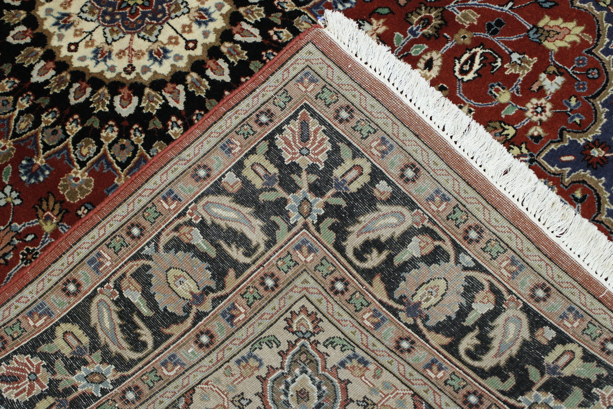 Traditional Fine Qum hand-knotted wool rug in Black & Red, full view