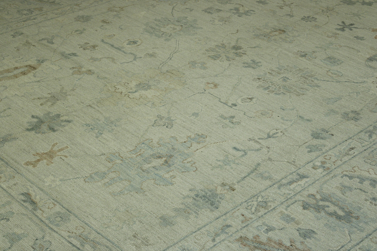 Blue & Rust Oushak Chobi rug in room setting