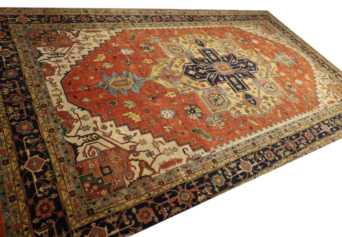 Sherapi medallion pattern detail, blue and rust rug
