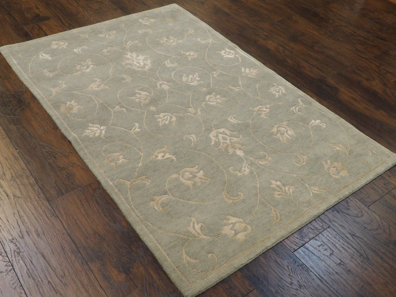 Blue leaves rug in a room setting