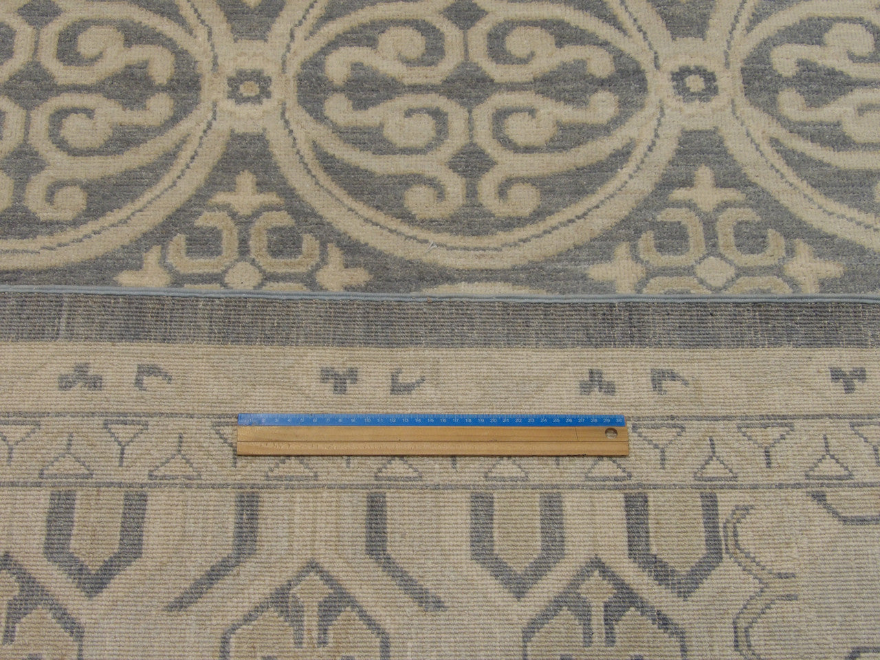 Khotan pattern detail, beige and blue natural dye rug