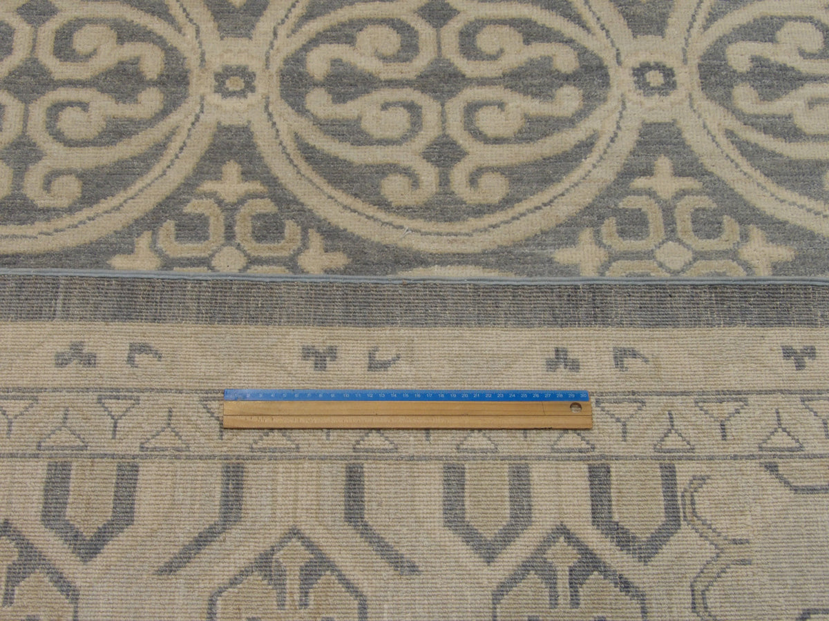 Khotan pattern detail, beige and blue natural dye rug