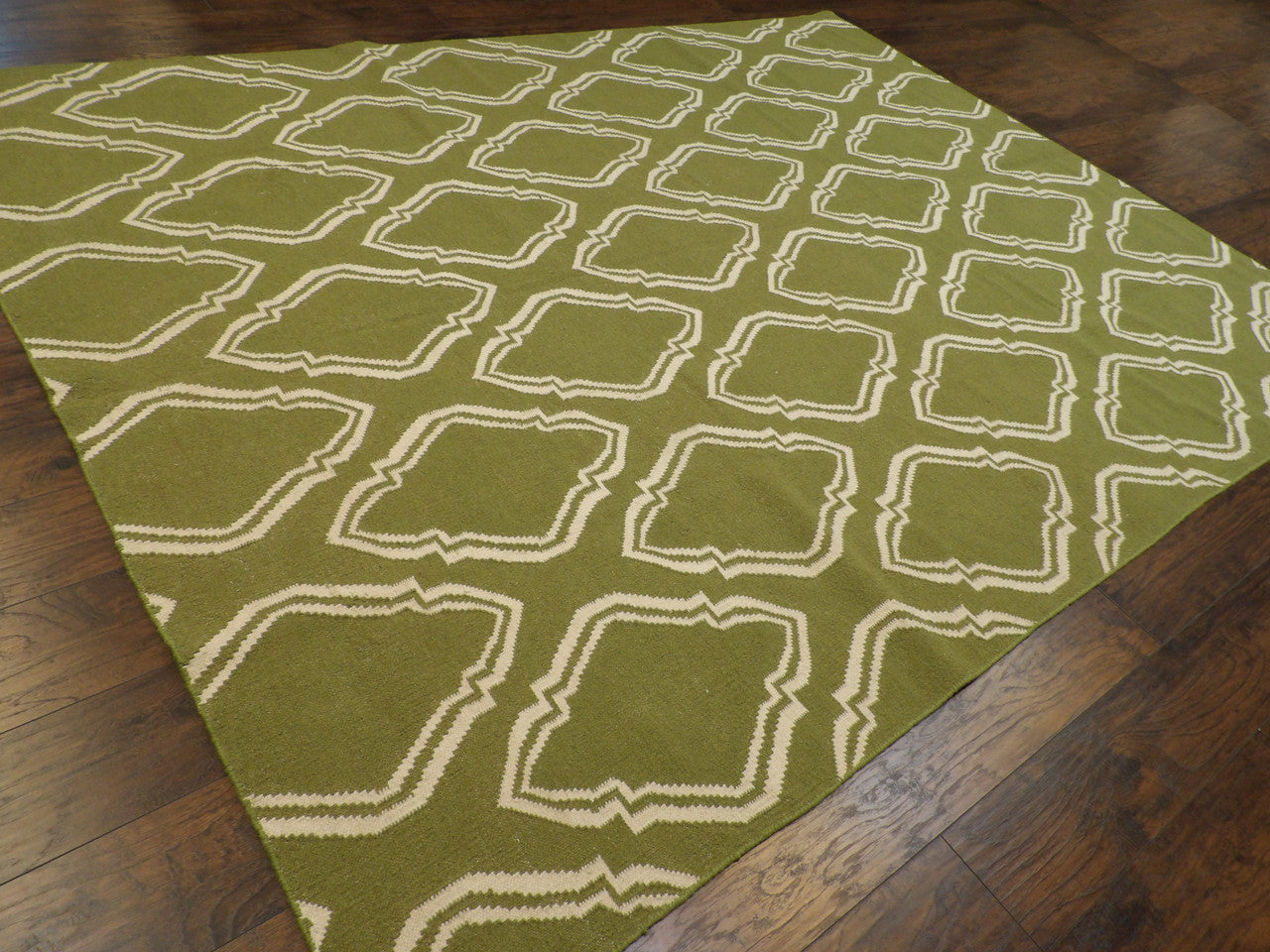 Coastal pattern detail, green rug