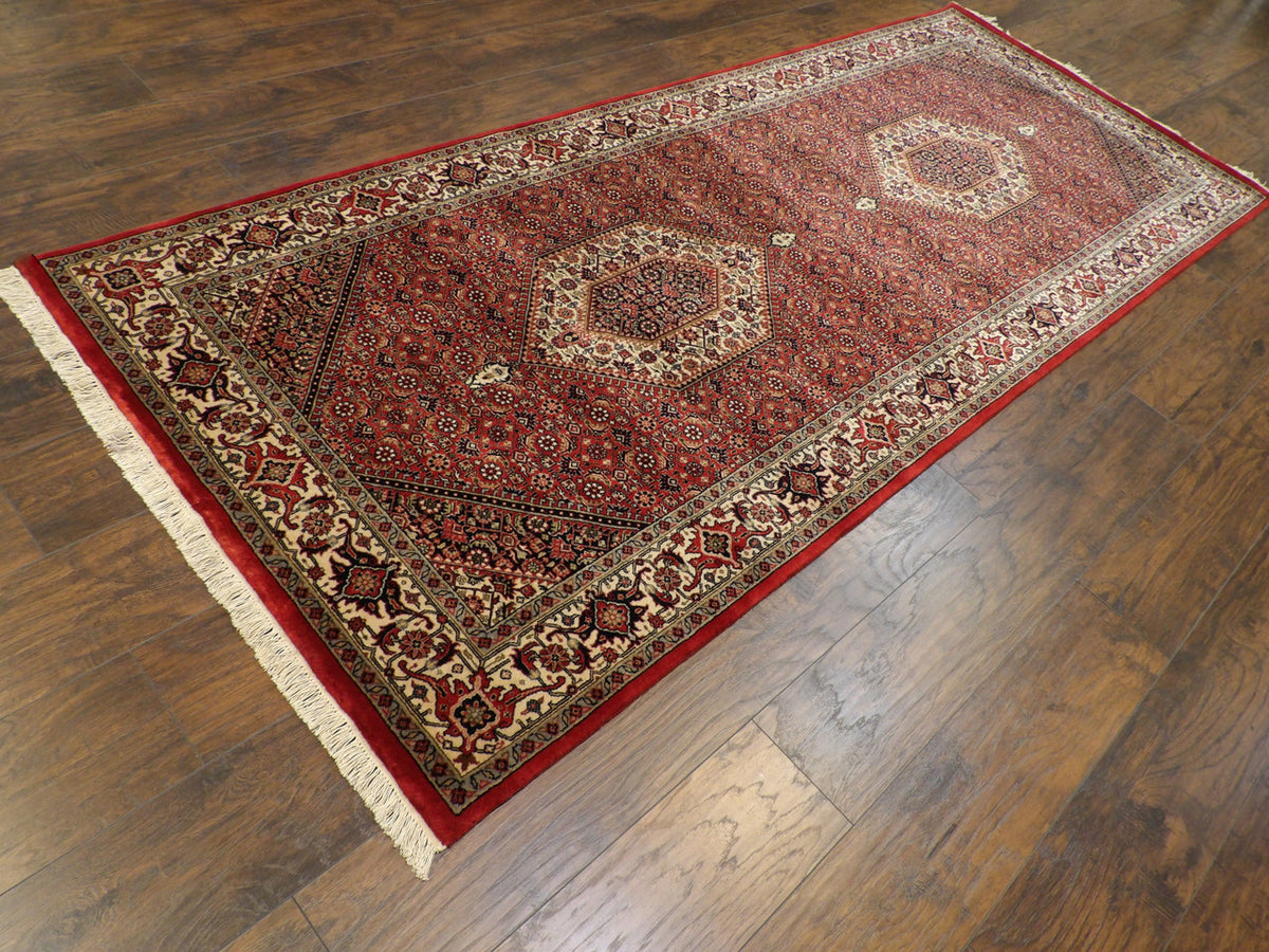 Red Bidjar runner in a formal hallway setting