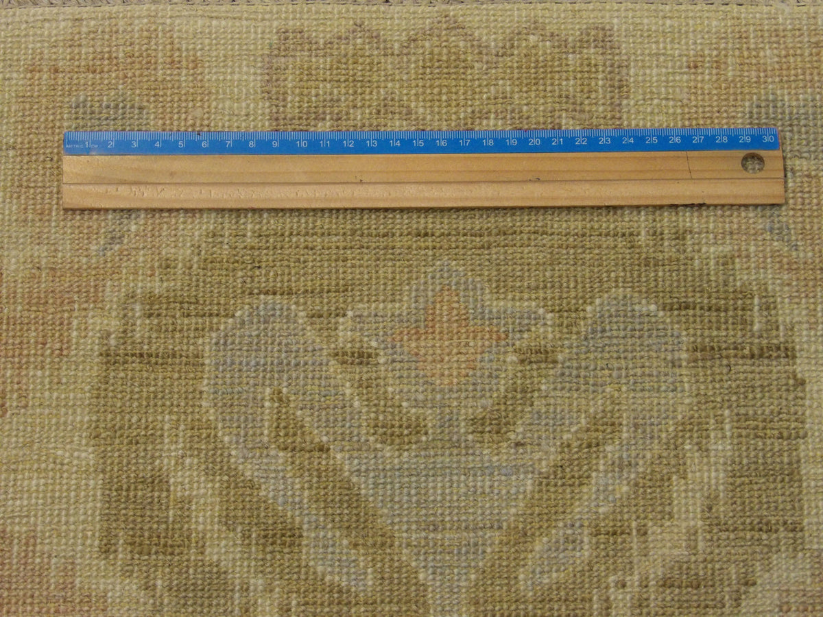 Blue and ivory Ikat rug in room setting