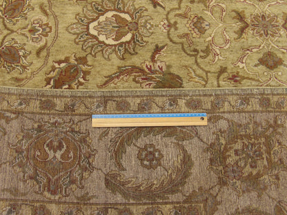 Full room view of green Ziegler tie-dye hand-knotted rug