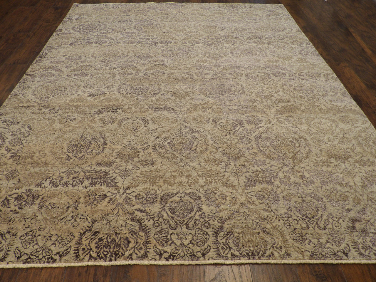 Close-up of wool-silk pile, gray and purple rug