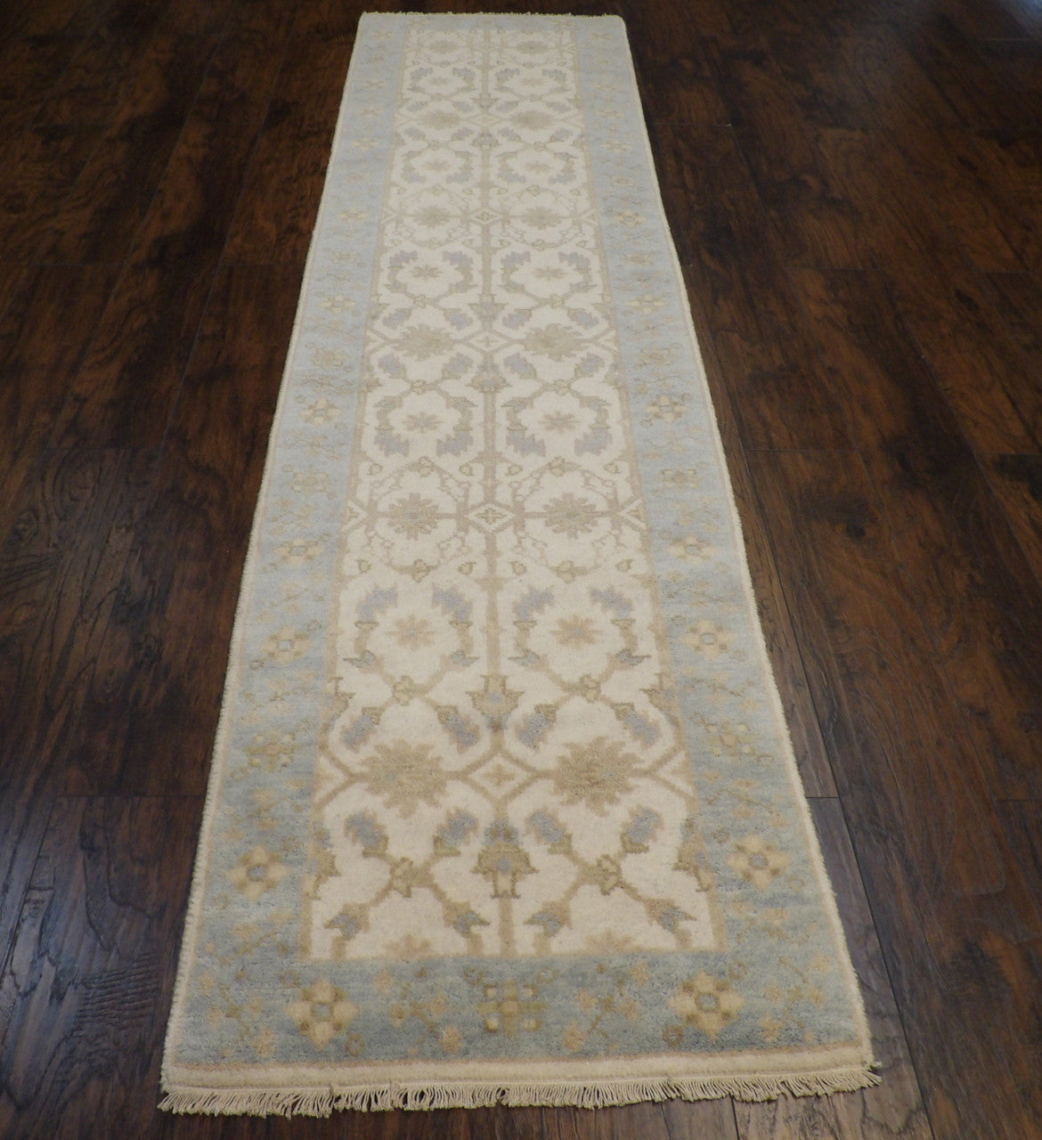 Close-up of wool pile, blue and ivory runner