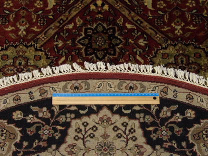 Black & Red Fine Persian Tabriz rug in room setting