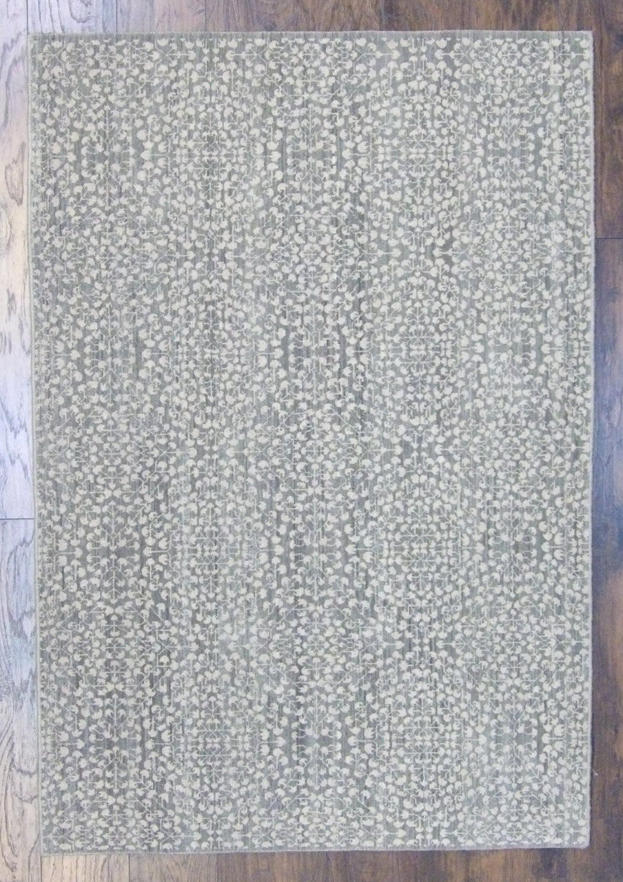 Transitional floral design hand-knotted wool rug in green, full view