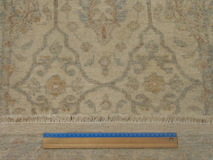Blue and ivory Oushak runner in hallway setting