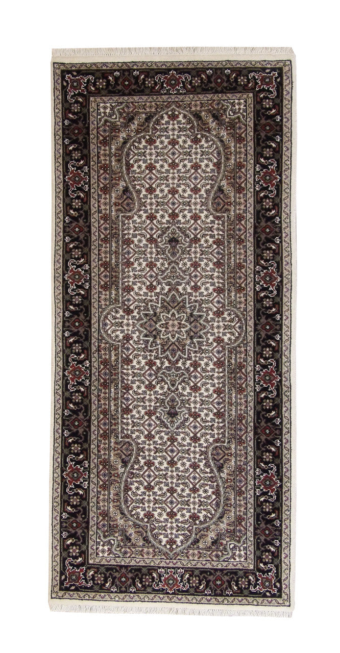 Traditional Indo Qum hand-knotted wool rug in Beige, full view