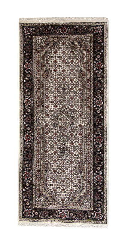 Traditional Indo Qum hand-knotted wool rug in Beige, full view