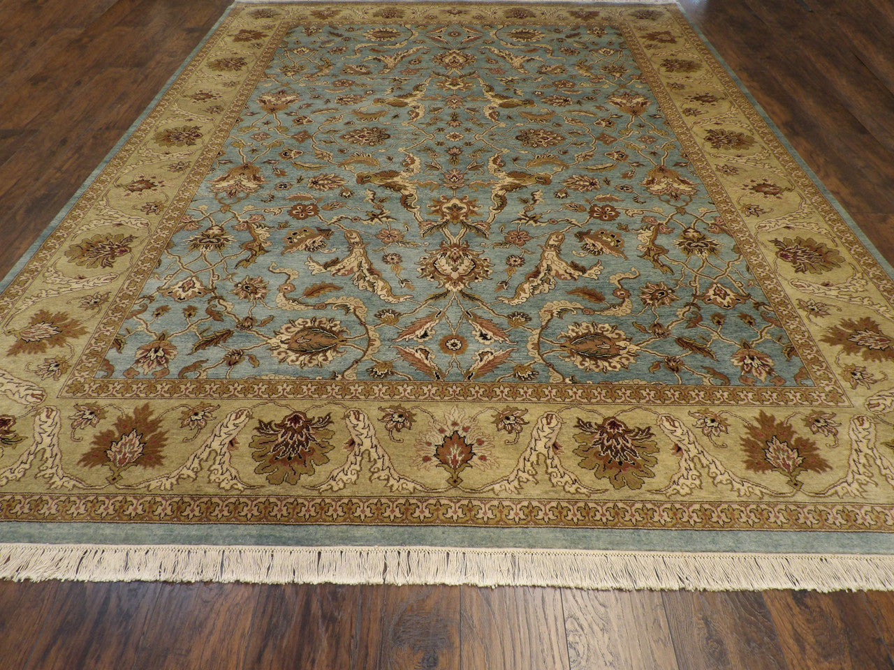 Close-up of wool pile, blue and gold rug