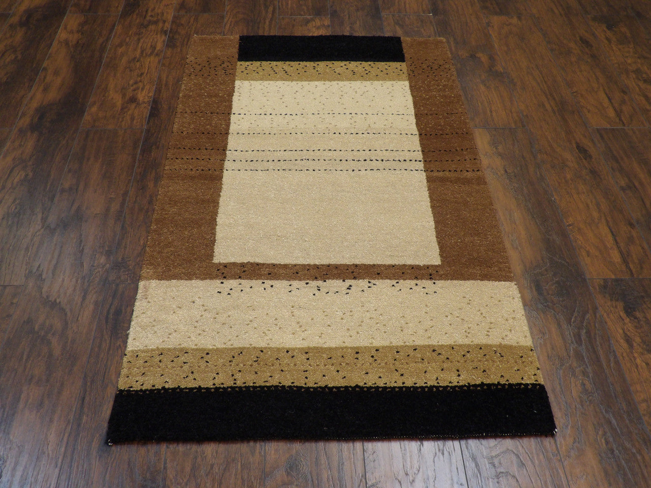 Close-up of wool pile, Black & Brown rug