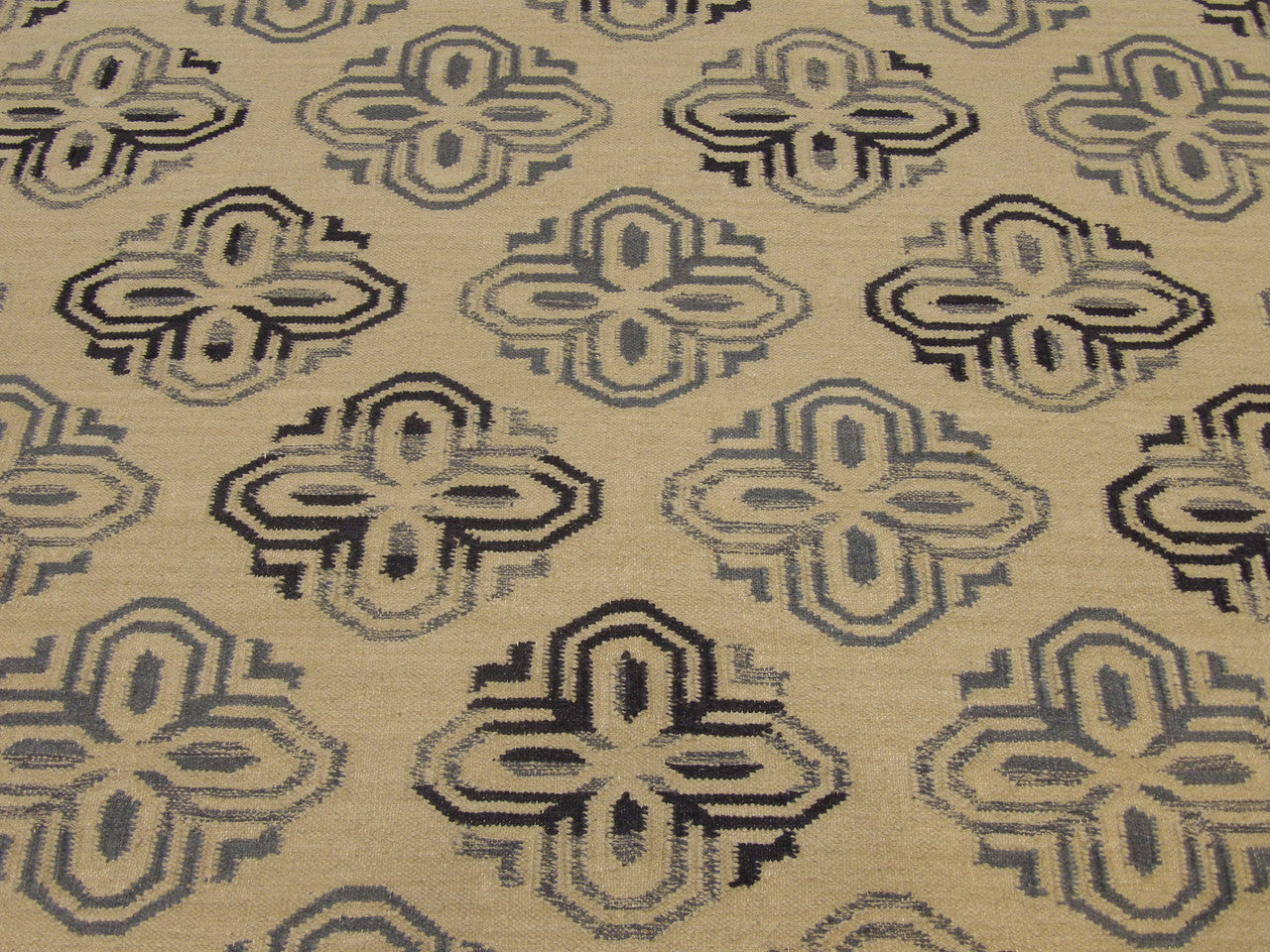 Coastal rug edge detail, gold and ivory