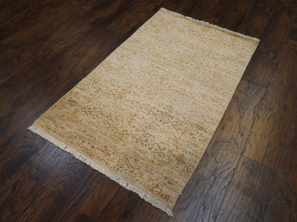 Broken pattern detail, gold rug