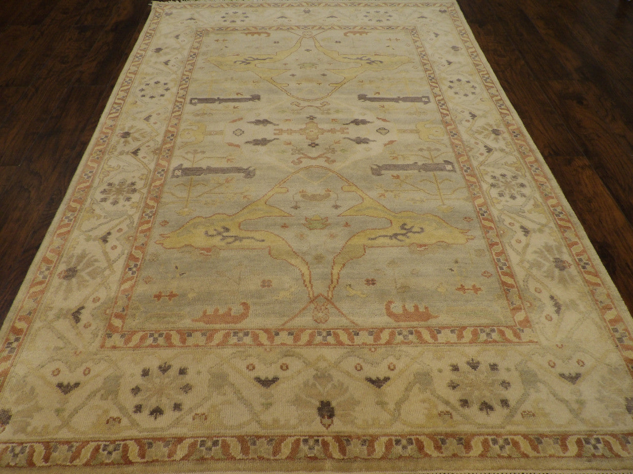 Close-up of wool pile, Green & Beige rug