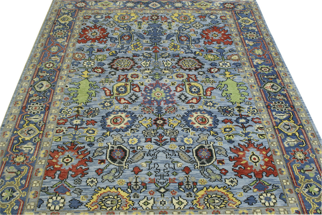 Blue Oushak Colorful Ziegler rug in room setting