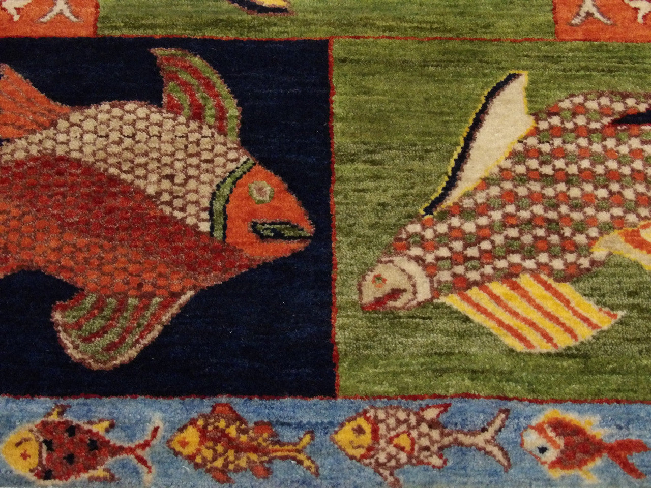 Coastal fish rug border detail